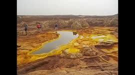 Ethiopia. Danakil Depression tour (11) Dallol -116m. Yellow sulphur deposit lake selfie. 2016