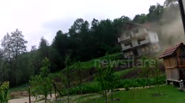 HOUSE COLLAPSES IN LANDSLIDE IN BOSNIA
