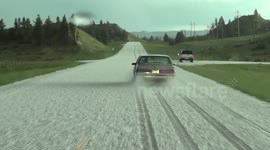 TORNADO HAILSTORM COVERS US HIGHWAY IN ICE