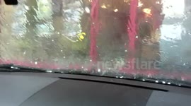heavy rain and hailstones in sunbury on thames, England