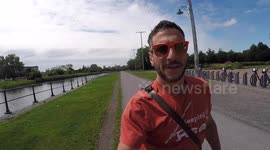 Man fishing on canal has close encounter with animal life