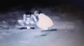 Two thieves avoiding unfairness divide spoils under surveillance camera