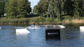 A pro wakeboarder having fun at the lake