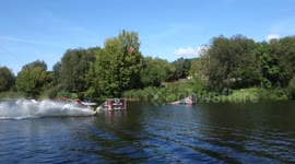 Small Lake 2 guys wakeboarding, Guess what happens next?