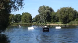 When a begginer and a pro surf together on a wakeboard