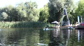 Pro and beginner Wakeboarding together