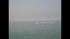 Kuwait. Skyline. Corniche. Views from Scientific centre and dhow harbour. Vistas y barcos de madera