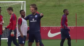 Sterling and Southgate engage in meaningful discussion during England training