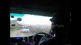 Lesotho. Malealea. Combis crossing full of people and loud music. 2016