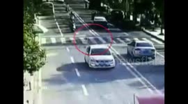 Terrifying moment little boy runs into road and is hit by car