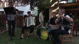 Groom and his band play amazing romani folk music at wedding