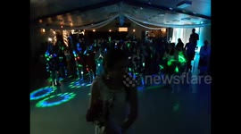 Women fight for bouquet at wedding in Canada