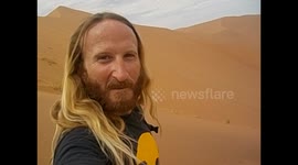 Namibia. Sossusvlei (5) Dead vlei, going down sand dune running and falling. 2016