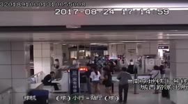 Man climbs into security scanner at underground station