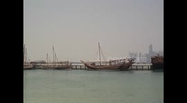 Qatar. Doha. Skyline, skycrapers. Boats, dhows and bay. Rascacielos y barcos. 2016