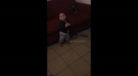 Baby taking first steps