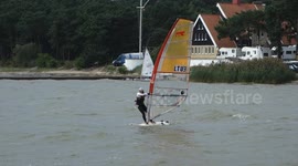 I am sailing home again, competition windsurf and catamarn
