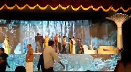 Wedding with water on the stage and music from Titanic