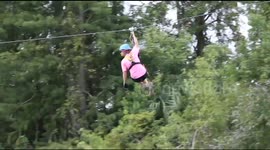 Alligator leaps out the water to try to bite woman on zipline