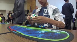15-year-old smashes world record for solving Rubik's Cube