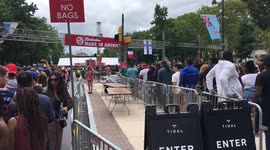 Made In America crowds gather and walk up the Ben Franklin Parkway in Center City Philadelphia.