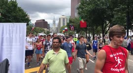Made In America crowds gather and walk up the Ben Franklin Parkway in Center City Philadelphia.