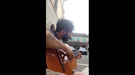 Man performs amazing flamenco style song on two-stringed guitar