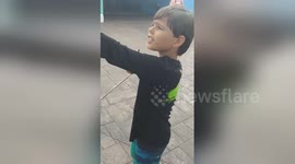Kid Flips Out Over Bumblebee