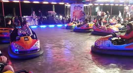 Guy at music festival screams for his life on bumper cars