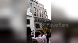 Newsflare Edit - Lady Gaga waves at fans after treating them to pizza