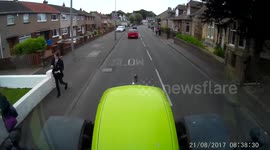 little darling throws something at the tractor windscreen