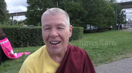 Buddhist Monk against DSEI arms fair protest outside Excel London
