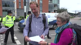 Activists singing to #StopDSEI outside Excel London