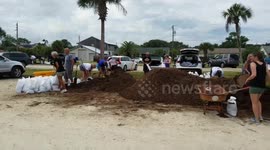 Florida residents fill up sandbags in preparation for Hurricane Irma