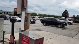 Cars line up at Florida petrol station before Hurricane Irma hits