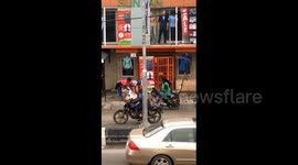 Comical Character On A Motorbike