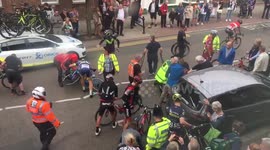 Cyclists crash into parked car during Tour of Britain