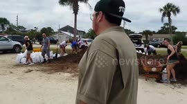 Florida residents fill up sandbags in preparation for Hurricane Irma