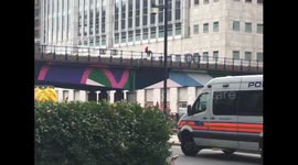 Dramatic moment man is saved from Canary Wharf railway bridge