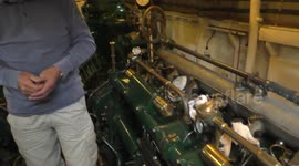 Richard E. Beet show us the Massey Shaw Fireboat engine at the Classic Boat Festival