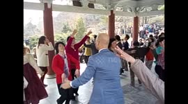North Korea. DPRK. Pyongyang V. 2015 (3) Park dancing with locals. People dancing.