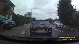 Lady stops at Traffic lights then runs off to deliver parcel.