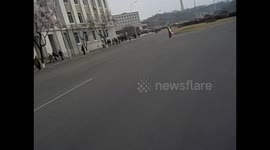 North Korea. DPRK. Pyongyang. Marathon 11. Finishing race running. Arch of triumph. 2015