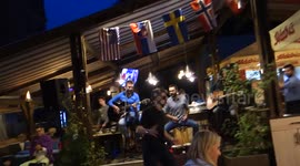 Watch this Crazy man starts dancing as soon as the guitar plays.