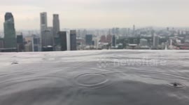 Rain At The Top Of Marina Bay Sands (slowmo)