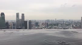 Rain At The Top Of Marina Bay Sands Hotel (non slowmo)