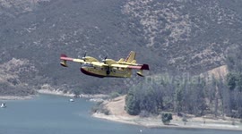 super scooper aircraft nice close-up fly-by