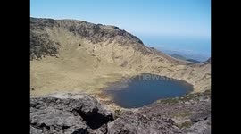 South Korea. Corea del Sur. Jeju island. Mt. Hallasan. Summit views, crater and ocean. 2015