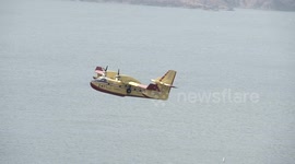 super scooper good close-up fly-by in slow motion