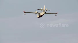 super scooper slow motion close-up flyover (flying away)